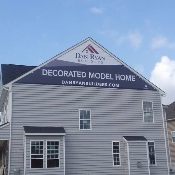A-Frame Shaped Banner Installed On Home by Sign Central Inc