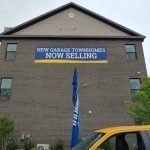 Banner Installed On Building by Sign Central, Inc.