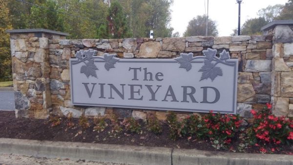 Stone monument by Sign Central, Inc. at The Vineyard