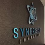 Synergist Computing Interior Chrome Standoff Sign by Sign Central, Inc.