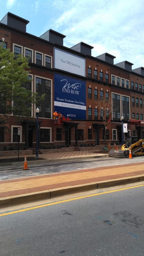 Large building banner in Annapolis MD by Sign Central, Inc.